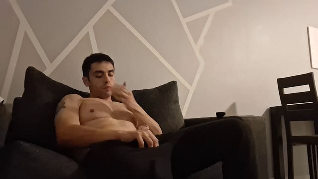 Boy masturbates while watching a movie